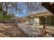 Inviting backyard with hardscape, mature trees, and patio, ideal for relaxation at 2367 E Hacienda Ave, Las Vegas, NV 89119