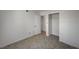 This bedroom features neutral paint, tiled floor, and a convenient closet for organized living at 2367 E Hacienda Ave, Las Vegas, NV 89119