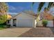 A well-maintained home with a two-car garage, and low maintenance rock landscaping at 2367 E Hacienda Ave, Las Vegas, NV 89119