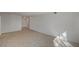 Bright living room with tiled floors, offering ample space and easy access to other areas at 2367 E Hacienda Ave, Las Vegas, NV 89119