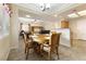 Open-concept dining area with seamless flow into the living space, great for entertaining at 313 Haley Way # D, Mesquite, NV 89027