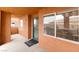 Home entrance featuring a teal door, tiled flooring, and outdoor balcony at 313 Haley Way # D, Mesquite, NV 89027