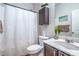 Cozy bathroom with a shower, toilet, vanity, and medicine cabinet for storage at 3237 Mist Effect Ave, Henderson, NV 89044