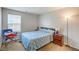 Bright bedroom featuring carpet, good lighting, and neutral colored walls at 3237 Mist Effect Ave, Henderson, NV 89044