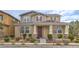 Charming two-story home with a well-maintained yard and inviting front porch at 3237 Mist Effect Ave, Henderson, NV 89044
