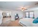 Spacious main bedroom with ensuite and ceiling fan for comfort at 3237 Mist Effect Ave, Henderson, NV 89044