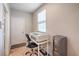 Small office with a desk, printer, and water dispenser at 3237 Mist Effect Ave, Henderson, NV 89044