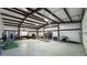 Expansive garage featuring a high ceiling, steel beams, and ample space for storage and activities at 3341 S Big Sky Way, Pahrump, NV 89048