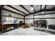 Spacious garage area with concrete floors, workbench, and ample storage space at 3341 S Big Sky Way, Pahrump, NV 89048