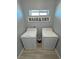 Dedicated laundry room with white washer and dryer units and a small window for natural light at 3341 S Big Sky Way, Pahrump, NV 89048