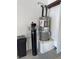 Utility area featuring water heater and filtration system at 3341 S Big Sky Way, Pahrump, NV 89048