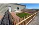 Home exterior featuring a fenced in area with turf and gravel at 3341 S Big Sky Way, Pahrump, NV 89048