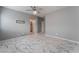 Relaxing bedroom with sleek white marble floors, a ceiling fan, and TV mount for easy setup at 4625 Ridgeley Ave # 103, North Las Vegas, NV 89084
