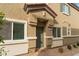 Charming front entrance with a well-lit porch, neat landscaping, and stylish exterior at 4625 Ridgeley Ave # 103, North Las Vegas, NV 89084
