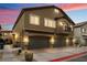 Stylish two-story home featuring a three-car garage, balcony, and well-maintained landscaping at 4625 Ridgeley Ave # 103, North Las Vegas, NV 89084