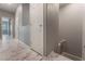 Hallway with white marble style floor and staircase at 4625 Ridgeley Ave # 103, North Las Vegas, NV 89084