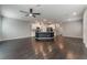 Spacious living room with hardwood floors, fan, and recessed lighting at 4625 Ridgeley Ave # 103, North Las Vegas, NV 89084