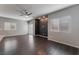 Open living area with recessed lighting, hardwood floors, and sliding door access to patio at 4625 Ridgeley Ave # 103, North Las Vegas, NV 89084