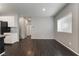 Bright living space adjacent to kitchen, featuring modern flooring and ample natural light at 4625 Ridgeley Ave # 103, North Las Vegas, NV 89084