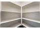 Walk-in pantry offering generous storage space with white shelving at 4625 Ridgeley Ave # 103, North Las Vegas, NV 89084