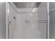 Modern tiled shower with glass door and built in seat at 4625 Ridgeley Ave # 103, North Las Vegas, NV 89084