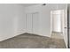 Carpeted bedroom with an entrance to a closet at 4730 E Craig Rd # 1093, Las Vegas, NV 89115