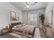 Modern bedroom with plush carpet, ambient lighting, and stylish decor and furniture at 4730 E Craig Rd # 1093, Las Vegas, NV 89115