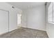 This carpeted bedroom has a closet and a window at 4730 E Craig Rd # 1093, Las Vegas, NV 89115