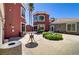 Well-maintained courtyard featuring a variety of seating options and desert landscaping at 4730 E Craig Rd # 1093, Las Vegas, NV 89115