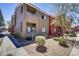 Multi-story apartment building with landscaping and convenient parking, creating an inviting exterior at 4730 E Craig Rd # 1093, Las Vegas, NV 89115
