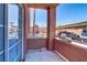 View from a private, outdoor patio area with textured columns and partial views at 4730 E Craig Rd # 1093, Las Vegas, NV 89115