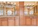 Detailed view of the bathroom with dual vanity, ample cabinetry, and granite countertops at 4775 N Grand Canyon Dr, Las Vegas, NV 89129