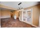 Dining area featuring modern lighting fixtures and access to backyard at 4775 N Grand Canyon Dr, Las Vegas, NV 89129