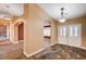 Welcoming foyer with decorative tile flooring and arched entryways at 4775 N Grand Canyon Dr, Las Vegas, NV 89129