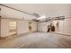 Well-lit garage provides ample storage with built-in cabinets and convenient access to additional rooms at 4775 N Grand Canyon Dr, Las Vegas, NV 89129
