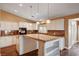 Modern kitchen featuring an island with granite countertop and stainless steel appliances at 4775 N Grand Canyon Dr, Las Vegas, NV 89129