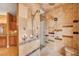 Custom tile shower with dual shower heads and built-in bench seating at 4775 N Grand Canyon Dr, Las Vegas, NV 89129