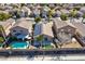 Private backyard featuring a refreshing in-ground pool, well-maintained landscaping, and a cozy patio area at 4900 Cascade Pools Ave, Las Vegas, NV 89131