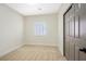 Cozy bedroom features plush carpeting and a sliding door closet at 4900 Cascade Pools Ave, Las Vegas, NV 89131