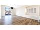 Bright living room with sliding glass doors to the backyard and shuttered window at 4900 Cascade Pools Ave, Las Vegas, NV 89131