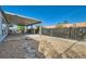 A charming backyard features a patio cover, gravel landscaping, and stone walkways, perfect for outdoor enjoyment at 518 Topaz Ave, Henderson, NV 89015