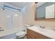 Bathroom showcasing a tub and shower combination, a toilet, and modern fixtures at 518 Topaz Ave, Henderson, NV 89015