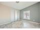Bedroom features closet, a window, and stylish flooring at 518 Topaz Ave, Henderson, NV 89015