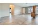 Spacious living room with tile floors, a front door, and plenty of natural light at 518 Topaz Ave, Henderson, NV 89015