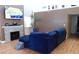 Spacious living room with hardwood floors, stone fireplace, and high ceilings at 5856 Sutcliffe Cir, Las Vegas, NV 89110
