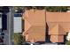 Detailed overhead view of the building highlighting the clay tile roof and surrounding parking area at 6160 Rumrill St # 201, Las Vegas, NV 89113
