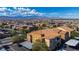 Aerial view of the community with desert landscaping and mountain views at 6160 Rumrill St # 201, Las Vegas, NV 89113