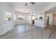 Bright living space with open kitchen, hardwood floors, and natural light at 6160 Rumrill St # 201, Las Vegas, NV 89113