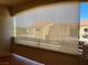 Outdoor patio with shade and view of the community buildings at 6160 Rumrill St # 201, Las Vegas, NV 89113
