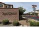 San Carlo Community entrance sign with manicured landscaping and street view at 703 Sleeping City Ave, Henderson, NV 89015